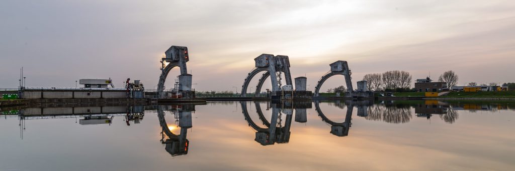 Weir near the islland of Maurik  in the Netherlands during sunse