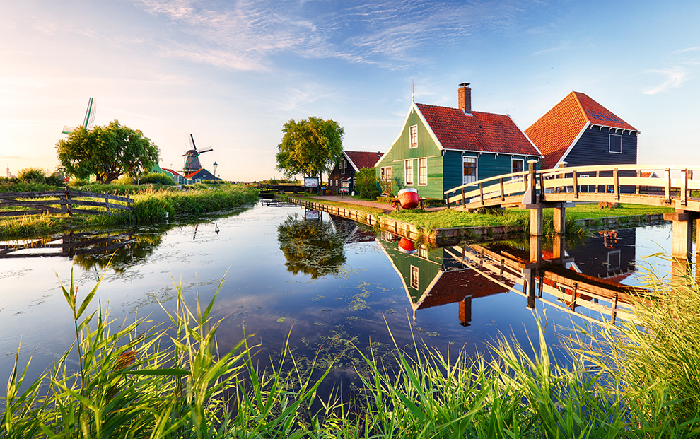 Traditional dutch windmill near the canal. Netherlands, Landcape