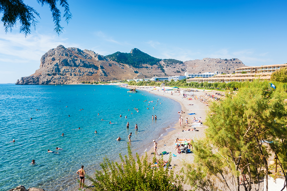 People enjoying their vacation on Kolymbia beach (Rhodes, Greece